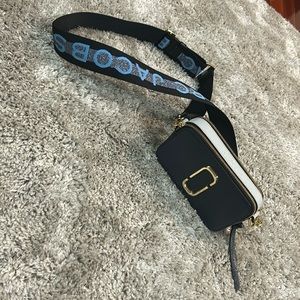 Marc Jacobs snapshot bag in blue. This bag is currently at Neiman for $325.